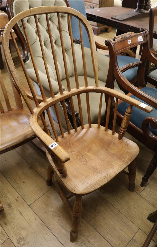 An early 20th century oak and elm Windsor chair